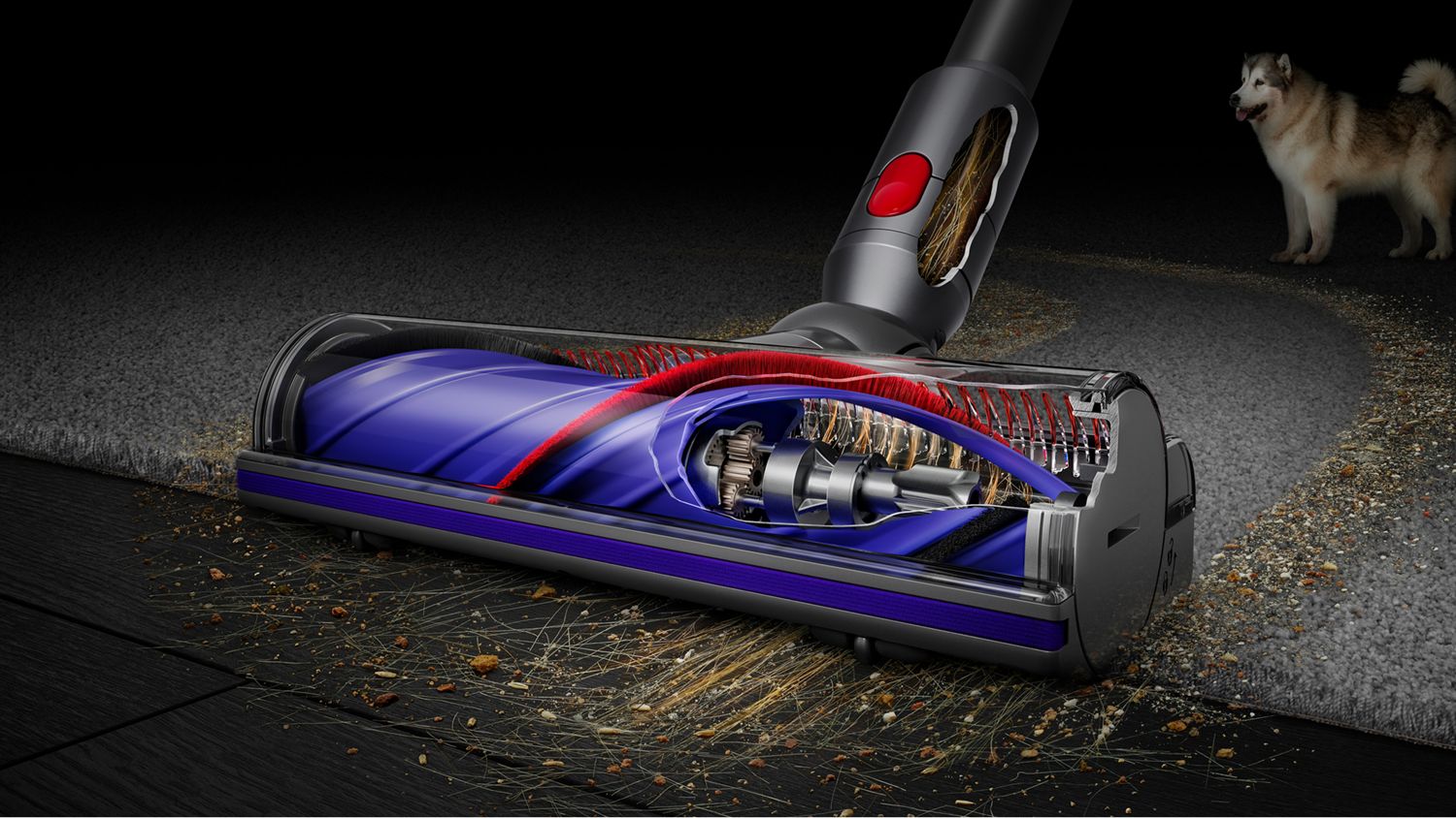 A cutaway of the Dyson V12 Detect Slim motorbars de-tangling technology between a hard floor and carpet.